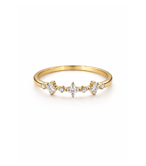 Gold ring with small diamonds on a white background