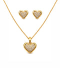 Gold heart-shaped jewelry set with necklace, pendant, and earrings on a white background