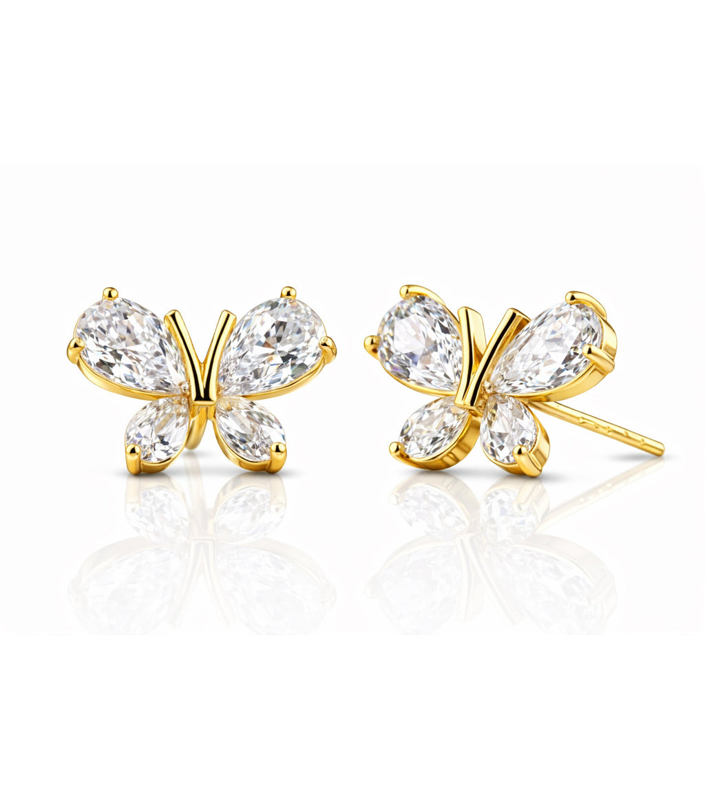 Gold butterfly earrings with clear gemstones on a white background