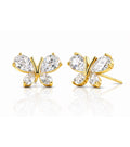 Gold butterfly earrings with clear gemstones on a white background