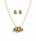 Gold necklace with three teardrop pendants and matching earrings on a white background