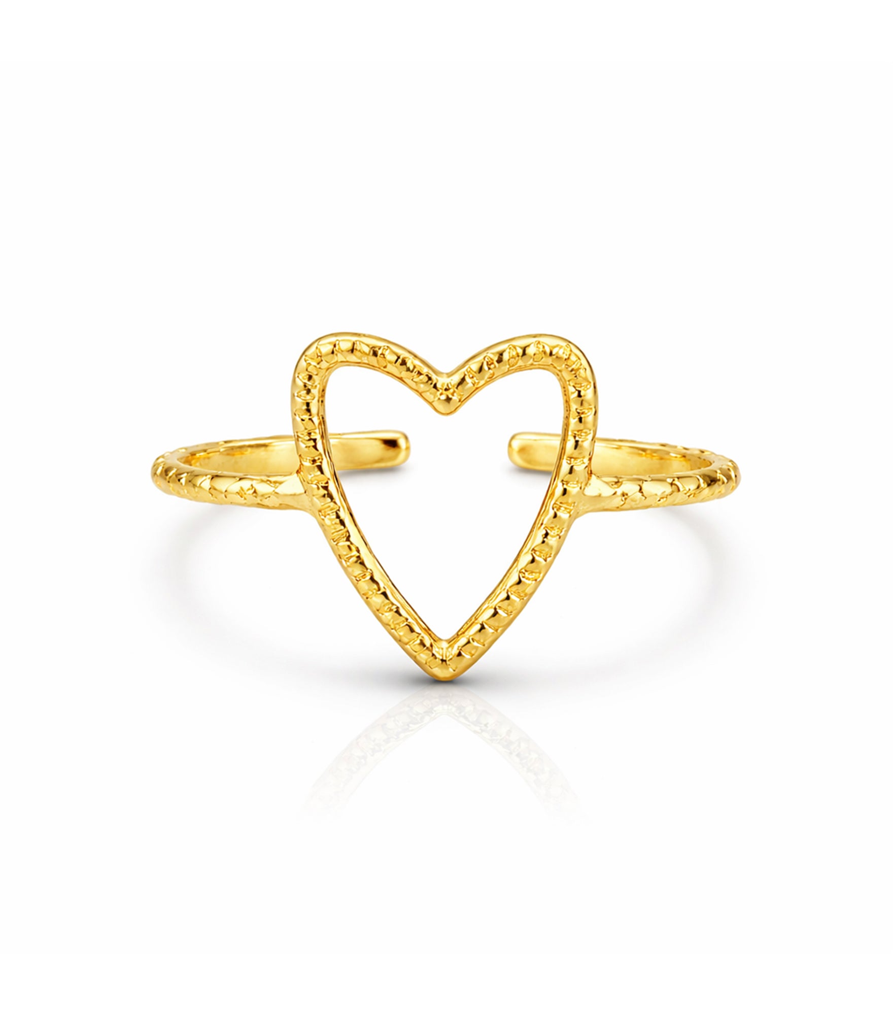 Gold heart-shaped ring on a white background