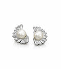 Pair of pearl earrings with silver accents on a white background