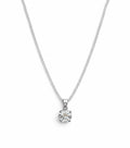 Silver necklace with a round diamond pendant on a white background