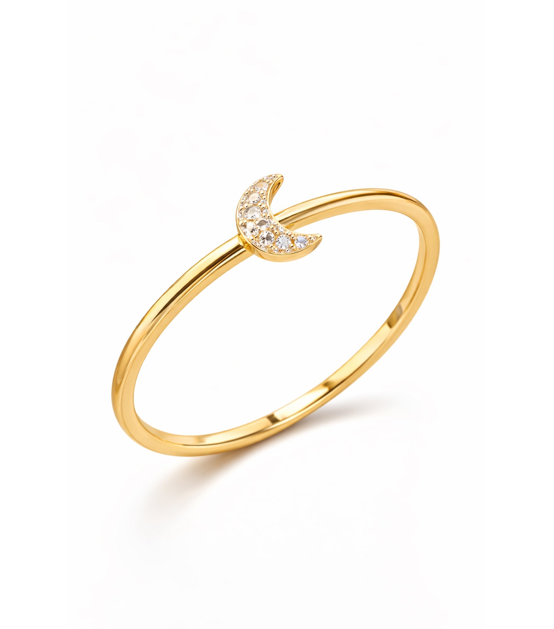 Gold ring with a crescent moon design on a white background

