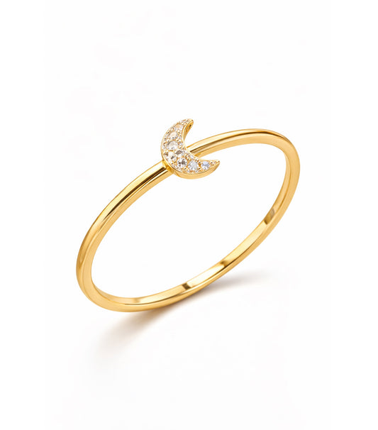 Gold ring with a crescent moon design on a white background

